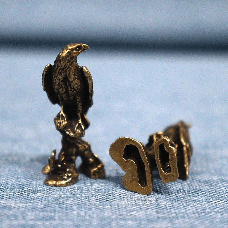 Statue perroquet doré