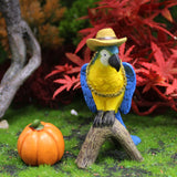 Figurine perroquet jaune et bleu